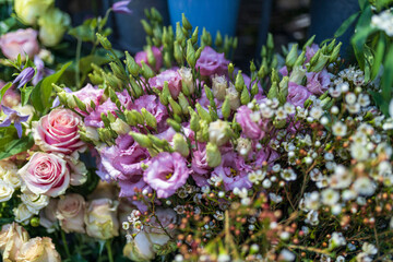 lisianthus or Pink eustoma flowers bouquet in a large basket for sale at the entrance to the store as a decoration
