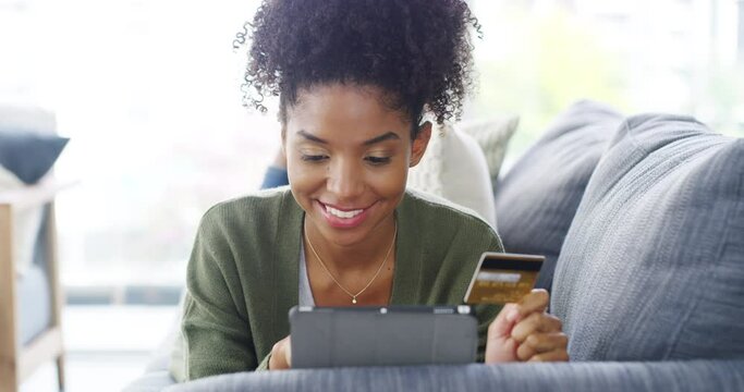 Online shopping, tablet and happy woman typing debit card info, verification process or web store search for discount offer. Home, retail sales and relax customer excited for credit limit increase