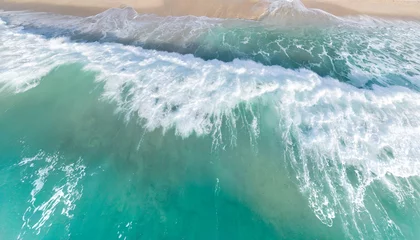 Schilderijen op glas overhead photo of crashing waves on the shoreline tropical beach surf abstract aerial ocean view © Florence