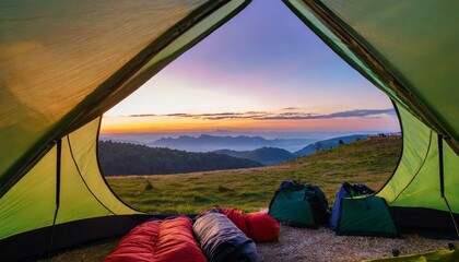 view of the serene landscape from inside a tent camping at campsite with sleeping bags stunning sunrise