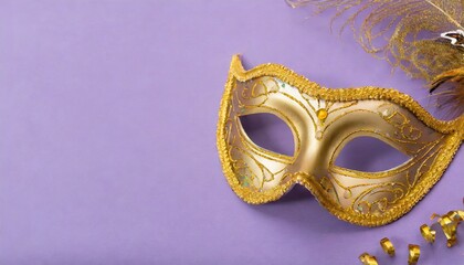 traditional golden venetian mask for festival mardi gras on purple background