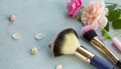 Obraz na płótnie Canvas brushes flowers and cosmetics