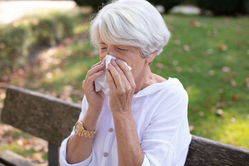 beautiful mature woman with pollen sickness