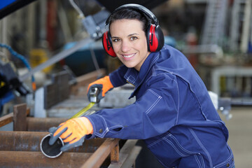 portrait of beautiful femalein factory