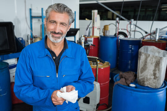 potrait of a happy mechanic man