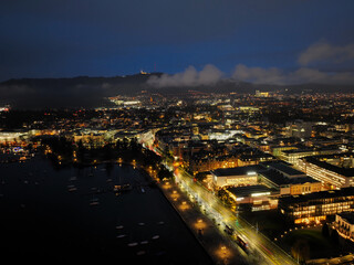 Aerial view of Swiss City of Zürich with cityscape, skyline, lake and city lights on a dark winter night. Photo taken January 5th, 2024, Zurich, Switzerland.