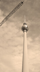 Fernsehturm (Television Tower) located at Alexanderplatz. The tower was constructed between 1965 and 1969 by the former German Democratic Republic, Berlin Germany - obrazy, fototapety, plakaty