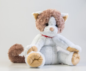 Soft children's toy spotted cat.