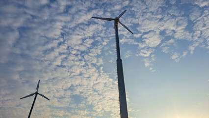 wind turbine against sky © Pawel Filusz