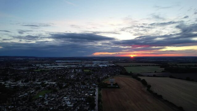 Aerial Time Lapse Footage of British Town During Sunset