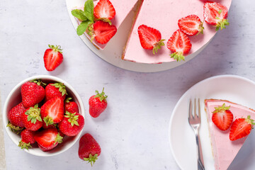 Strawberry cake. Menu concept. Homemade strawberry cake decorated with strawberries and mint leaves. Flat lay