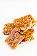 Brazilian dessert known as pé de moleque. Selective focus.