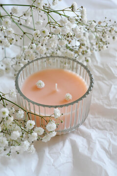 candle and beautiful white flowers