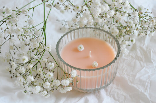 candle and beautiful white flowers