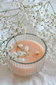 candle and beautiful white flowers