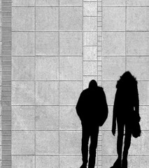 Shadow of a young couple - 703531077