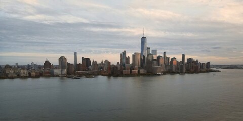 Fototapeta premium New York skyline. Manhattan view from New Jersey, New York skyscraper. Aerial view of Big Apple. New York panorama from Hudson. Cityscape landmark. Lower Manhattan NY.