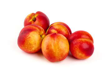 Fototapeta na wymiar Sweet juicy apricots, ripe nectarines, isolated on white background.