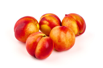 Sweet juicy apricots, ripe nectarines, isolated on white background.