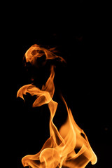 Fire flames isolated on black background, movement of fire flames abstract background
