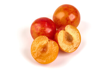 Yellow plums, isolated on white background.