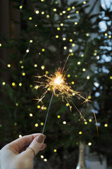 hand holding a sparkler
