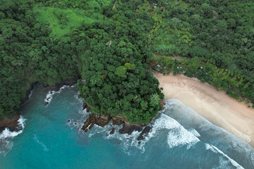 Exotic beach surrounded for an incredible jungle and blue ocean