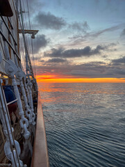 Sunrise over the Atlantic Ocean seen from a tall ship
