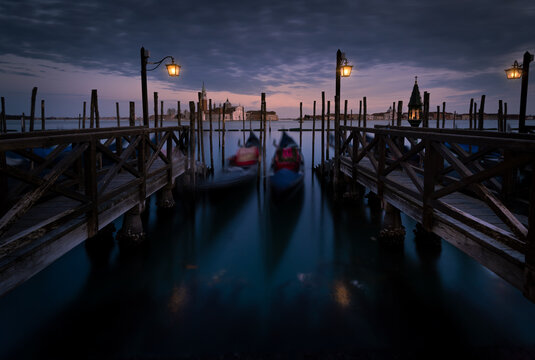 Venetian gondolas in the Canal Grande at night