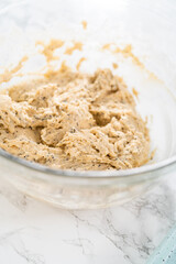 Lemon poppy seed muffins garnished with almond slivers