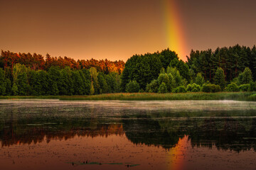 beautiful rainbow over the lake

