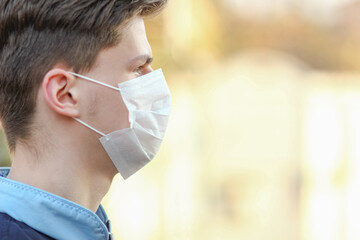 masked man from coronavirus and air. Protection against PM 2.5 air polluted from thea  virus in...