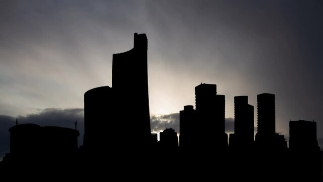 Libyan Capital Tripoli, Time Lapse at Sunrise with Fast Clouds and Dark Silhouette of Skyscrapers, Libya