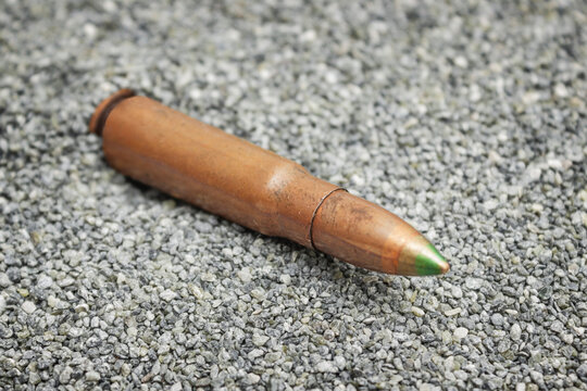 Cartridge 7.62 caliber for rifle found lying on the sand