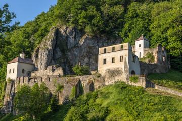 Fototapeta na wymiar The old Benedictine monastery Veľká Skalka standing on a rock near Trenčín.