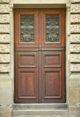 The texture of the old wooden door. Outdoor view