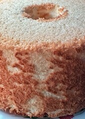 Side of baked angel food cake before icing