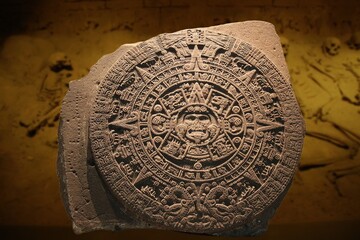 The stone of the Aztec calendar depicts the deity of the sun is not a calendar,is a sacrificial...