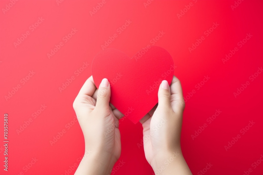 Poster heart in hands. background with selective focus and copy space
