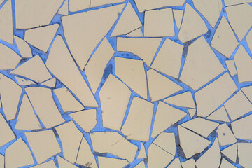 Rough textured surface of tile fragments. Background with selective focus and copy space