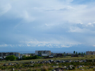 At lake Issyk-Kul, with Tian Shan Mountains