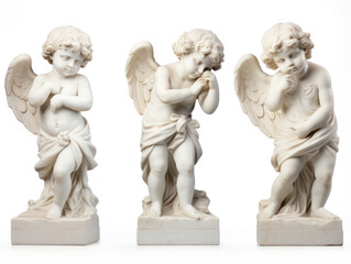 three cherub angel statues isolated on white background