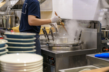 Japanese ramen kitchen in restaurant.