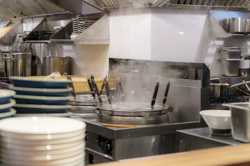 Japanese ramen kitchen in restaurant.