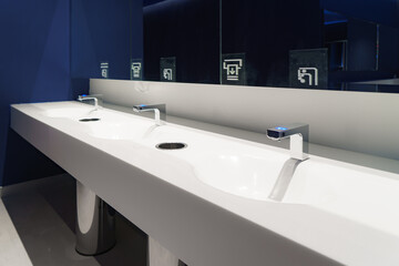 Faucets and sinks in modern bathrooms.