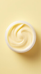 Cosmetic cream on yellow background top view mockup