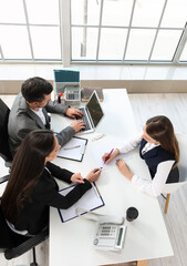 Human resources commission interviewing female applicant in office