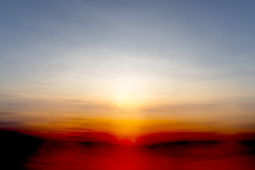 Obraz premium Beautiful and strange orange sky in the morning or evening used for natural background texture in decorative art work.