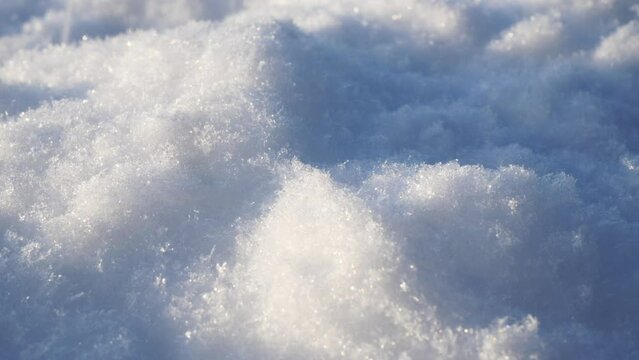 Crisp powder snow, shoveled around in a close up capture. Climate and temperature related concept.
