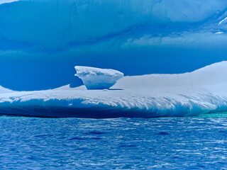 Beautiful blue icebergs in the North Atlantic Ocean off the entrance to Twillingate harbor in...